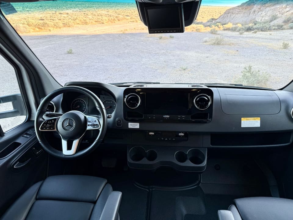 Mercedes-Benz Sprinter dashboard with touchscreen and leather seats